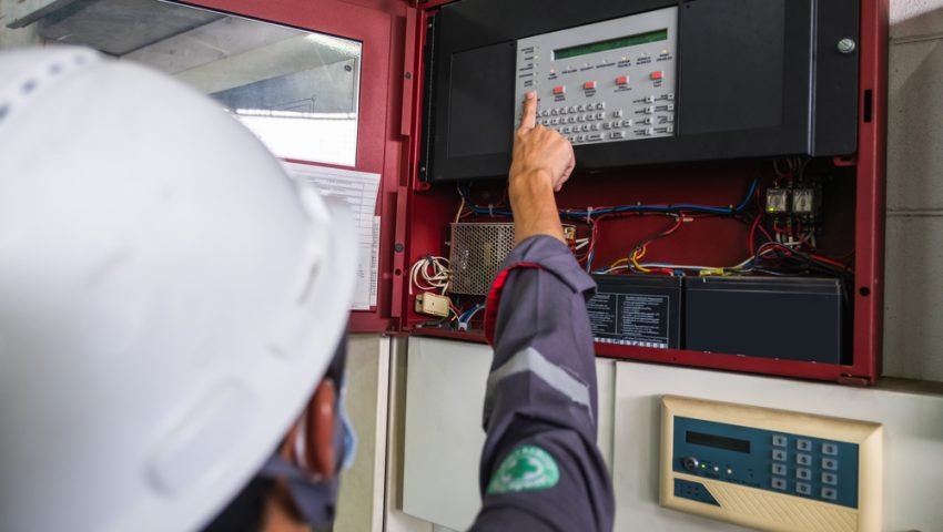 Technician,Checking,Doing,Work,Maintenance,Fire,Alarm,System,In,A